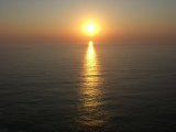 12 puesta del sol en cabo Fisterra.JPG
